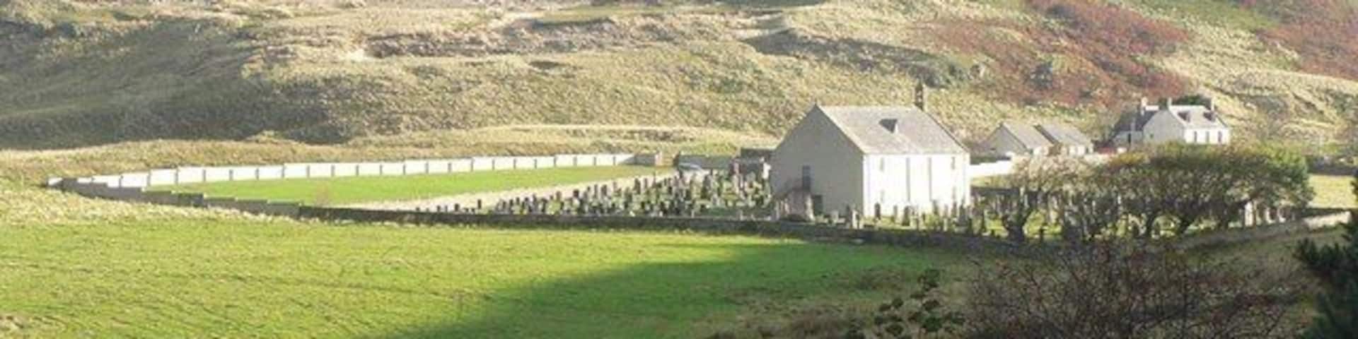 Looking back at Farr old church. A view of the 596767 from farther west along the main road.