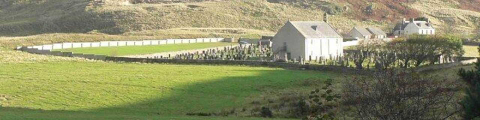 Looking back at Farr old church. A view of the 596767 from farther west along the main road.