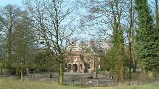Betley Court Betley Court through the trees