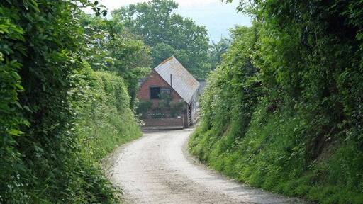 Down The Slope View down hill towards Pied House farm.