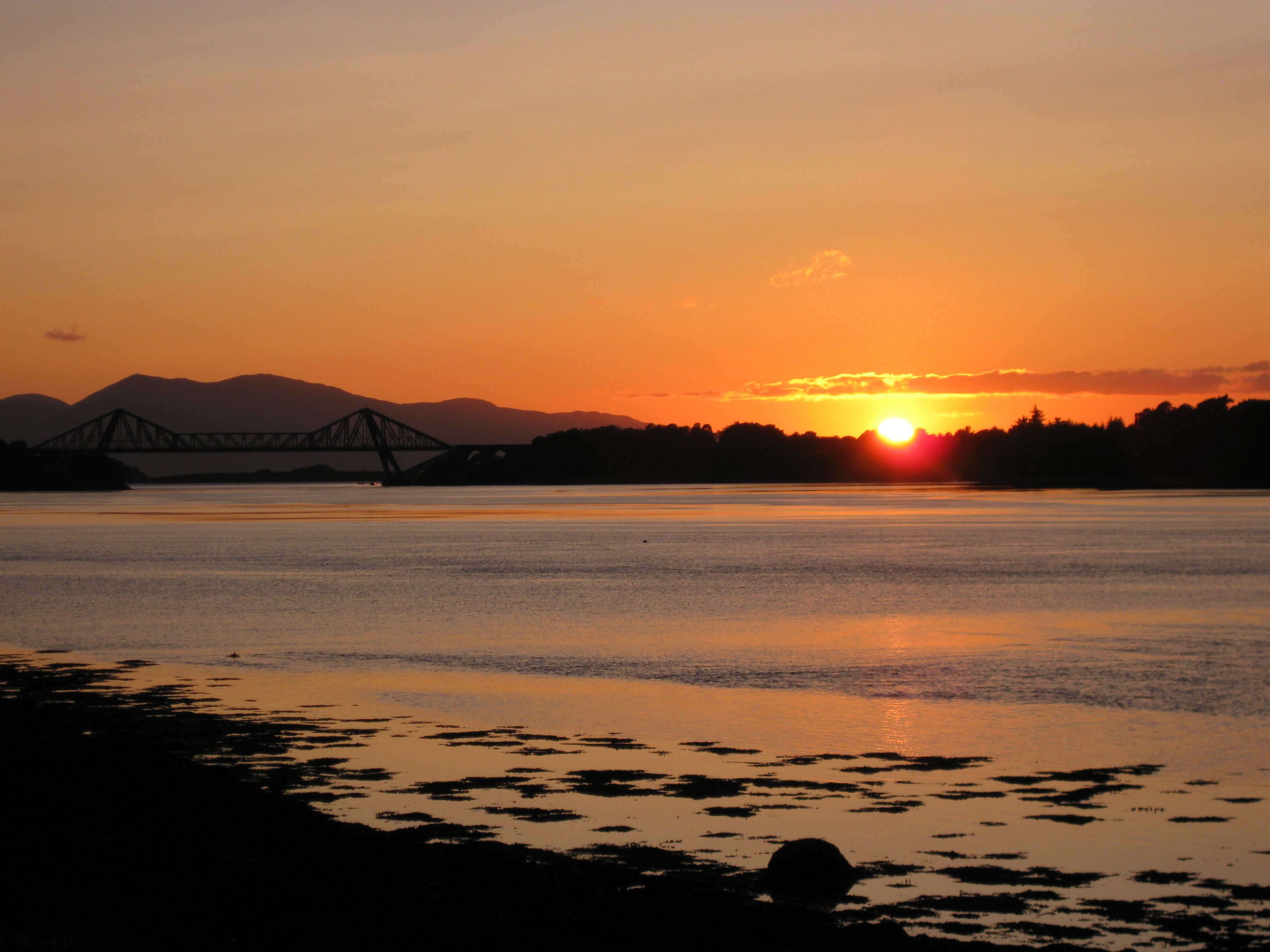 Loch Etive at sunset Connel Bridge in background