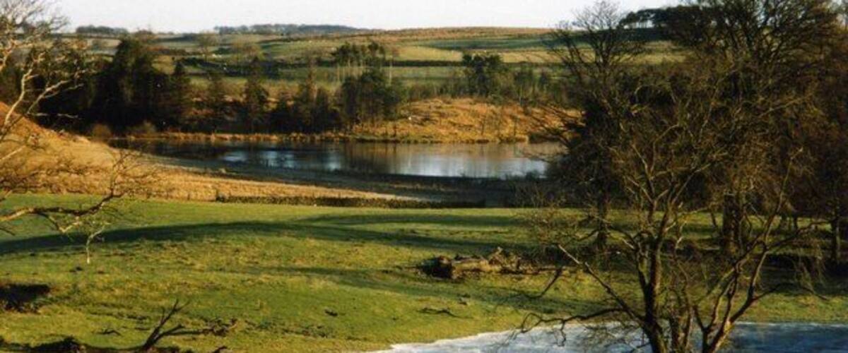 Icy Morning The larger body of water is Kirkleegreen Reservoir. Taken from spot height 157.