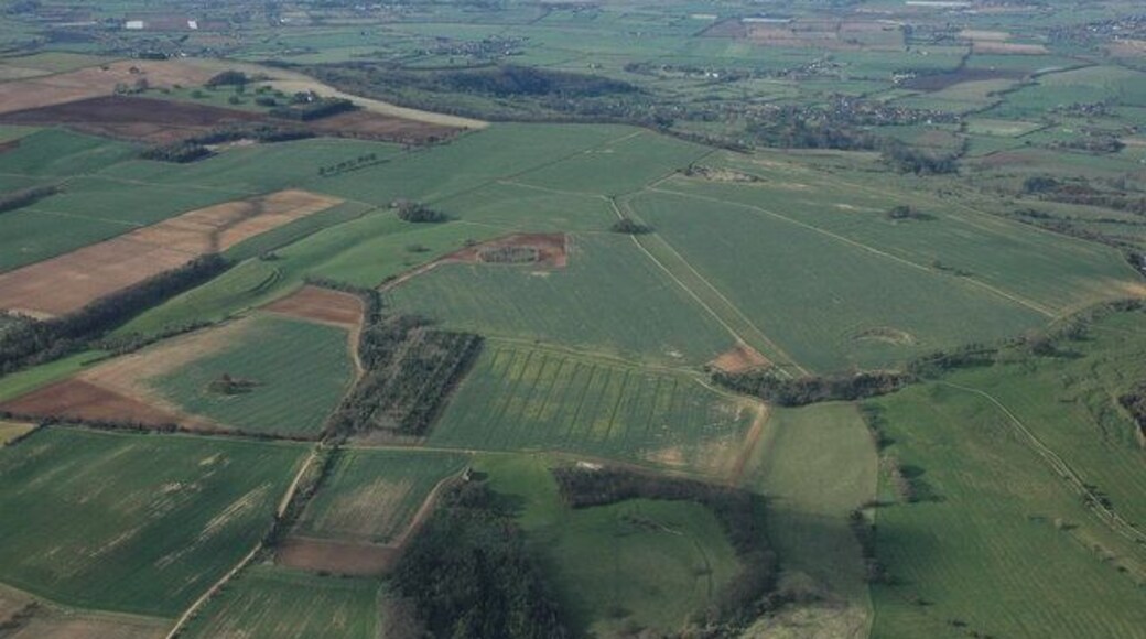 Bredon Hill from the air Bredon Hill is the largest of the Cotswold outliers and covers many grid squares, the hill is 299 metres above sea level at its highest point, though its height is lost in this view. The earthworks of Conderton Hillfort can be seen to the left of centre.