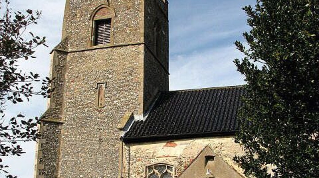 St Mary's church - porch and tower. St Mary's church has a late medieval tower and a Saxon doorway; the chancel dates from the late 13th century as is evidenced by the angle piscina > 831132 which is still in place. The interior was, however, extensively restored in the 19th century; medieval survivals are the C15 font, carved with arms of the Valoines family > 831134 and the original roof > 831127 - dating from the same time. The church is open every day. For more information see: http://www.norfolkchurches.co.uk/barney/barney.htm