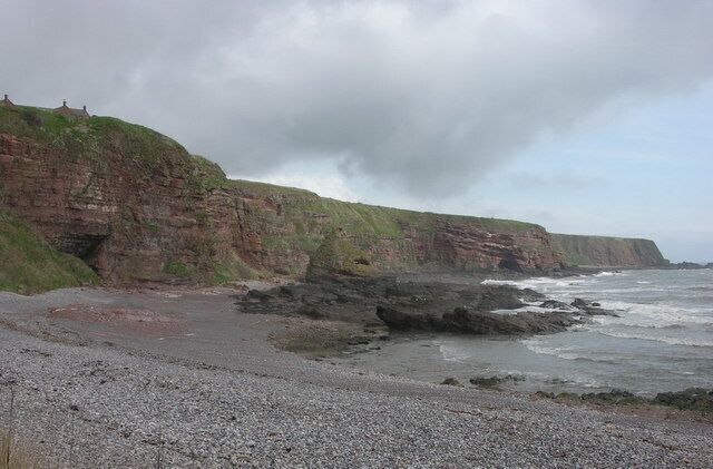 Maw Skellie, Auchmithie Wonderful name for the red sandstone cliff in the middle distance. Auchmithie was where the method for producing "smokies" was developed. The landowner forbad his serfs from leaving the village in case the secret method left with them.