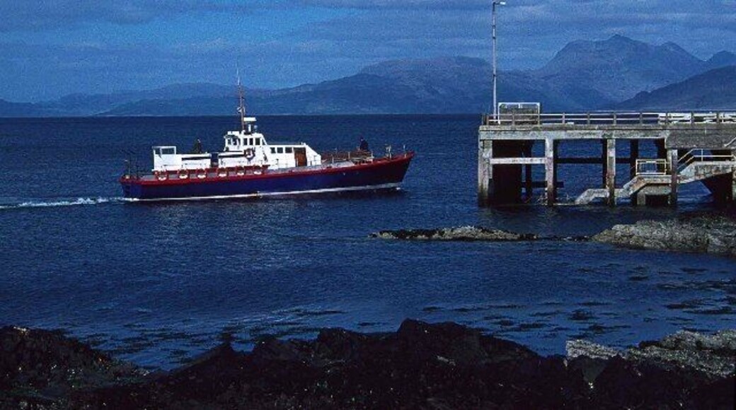 Armadale Pier, Isle of Skye. Armadale Pier before it was altered in 1994 to create a linkspan for ro-ro car ferry operations. (If the photo were taken today, you'd almost be standing on the linkspan (ramp) leading down to the car ferry.) The boat is the Shearwater which was the passenger ferry from Arisaig to the Small Isles from the '70s. The "Shearwater" started life as a Harbour Defence Vessel and was used in the D Day landings, she remained in active service until 1958. A new Shearwater is now on that run.