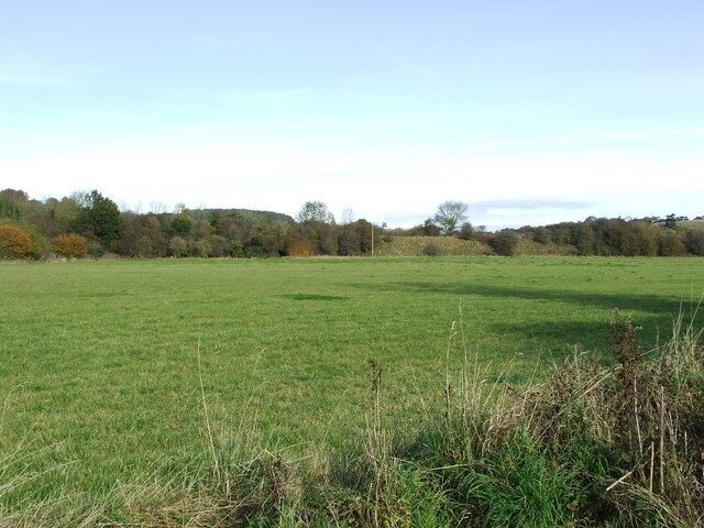 Site of a roman settlement, with old railway embankment in the background.