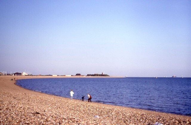 The shoreline at Stokes Bay The fort in the distance is Fort Gilkicker.