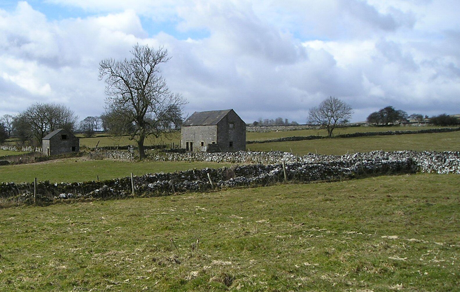 Barns near Alstonefield These barns are empty but cattle were traditionally housed in winter below and hay stored above.