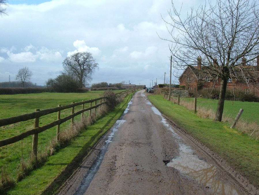 Farm road to Hill Farm According to my OS map, this track leads in the direction of Hill Farm from the hamlet of Addington.