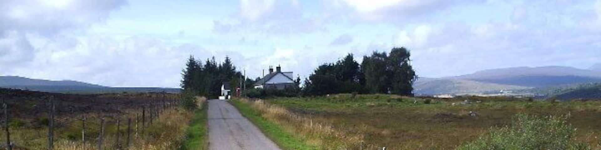 The Old School House. It has a phone box and a mail box! that was the first phone box I saw on this road.