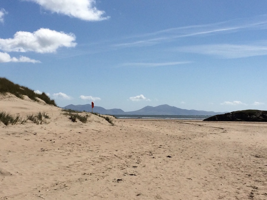 Fantastic and huge beach at Aberffraw backed by acres of sand dunes. Views over to Snowdonia.