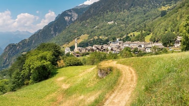 A mountainous landscape with a village nestled among the hills.