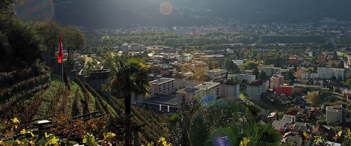 A mountainous landscape with a town nestled in the valley.