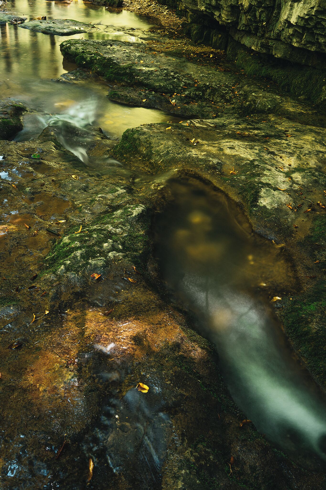 Along the way with the river on our right hand side, there are always pools of water reflecting the greenery color of the moss-covered boulders in the surrounding