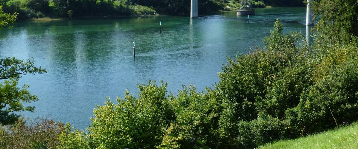 Rhine river and bridge west of Stein, at Hemishofen, Switzerland.