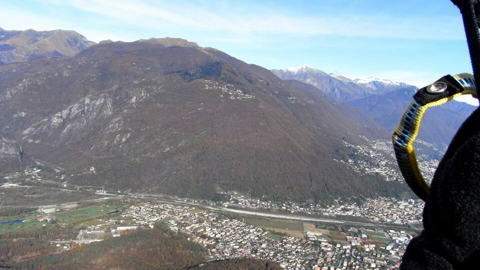 A mountainous landscape with a town nestled in the valley.
