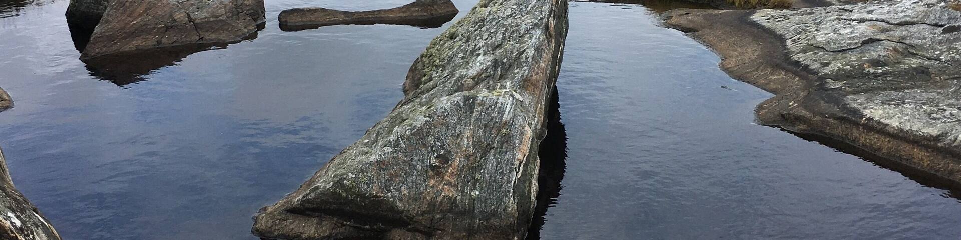 Cross over into Hono by ferry and head west to Ersdalsvagen and the nature preserve. Rock, sea, water and sky.