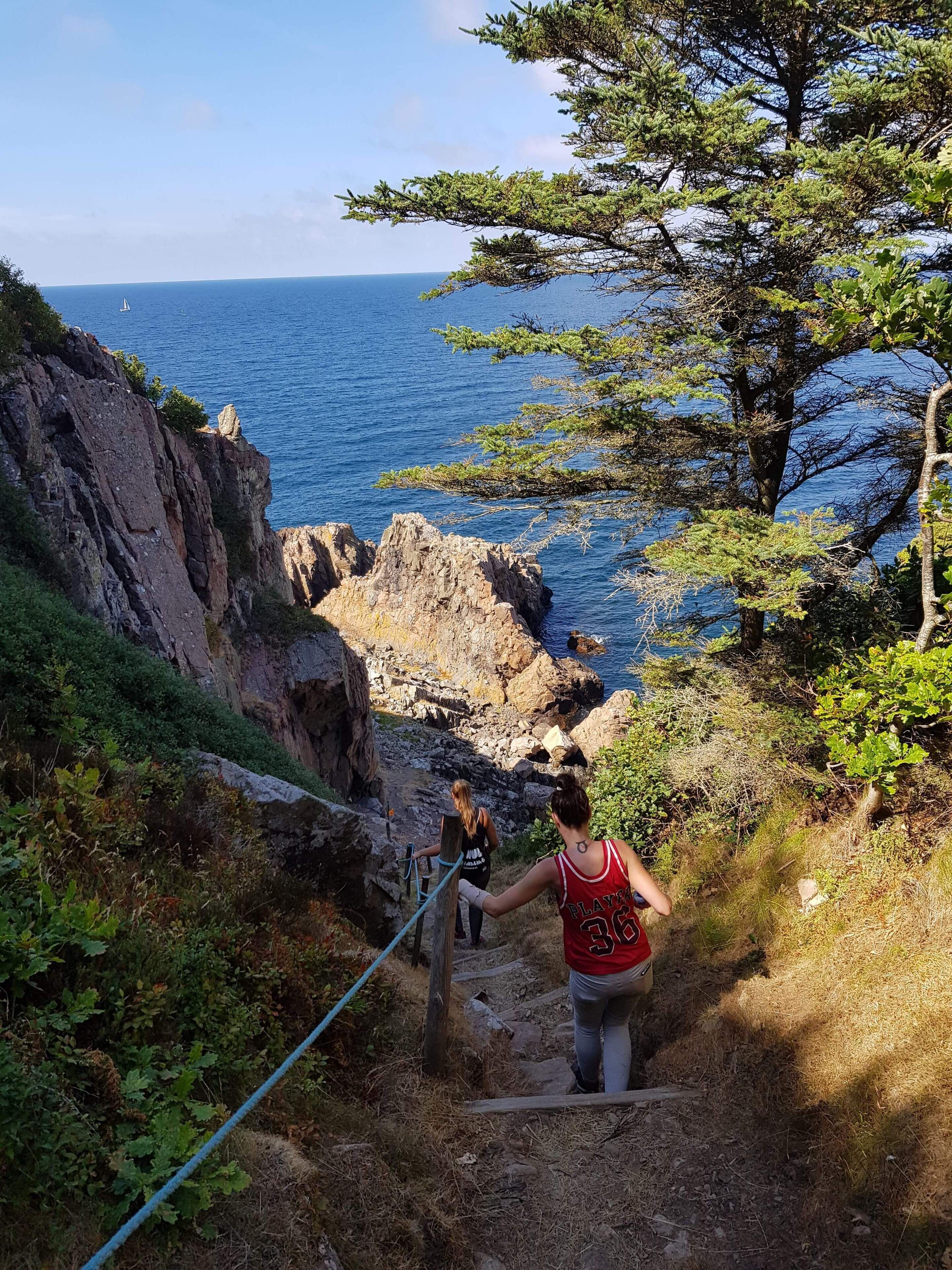 This is in Sweden, a place called Kullaberg right outside of Helsingborg. Here you can hike and climb on the cliffs by the ocean. It's very exciting, beautiful but dangerous. Once down, you can have a swim.. where's safe. It doesn't cost anything!