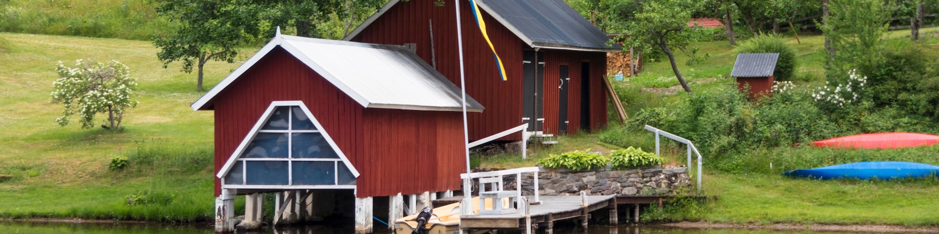 Haverud, Sweden A house is reflected in the water along the Dalsland Canal in western central Sweden on a bridge.