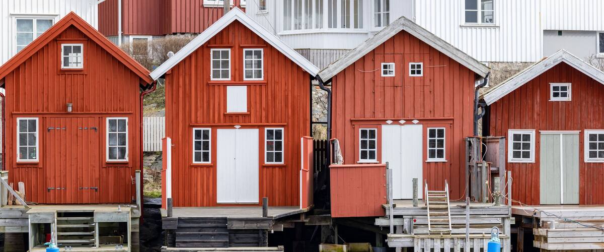 Swedish fishing village Hälleviksstrand with red and white houses near the sea