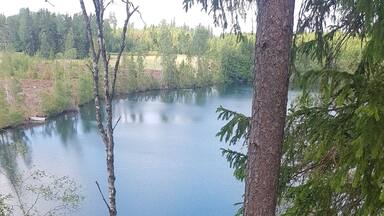 Sweden, Pikesjön in SmÄland. This is a quarry. What I've heard it's 14meter high up, I only jumped from 6 meter. It's very beautiful, clear and cool water. Great experience.