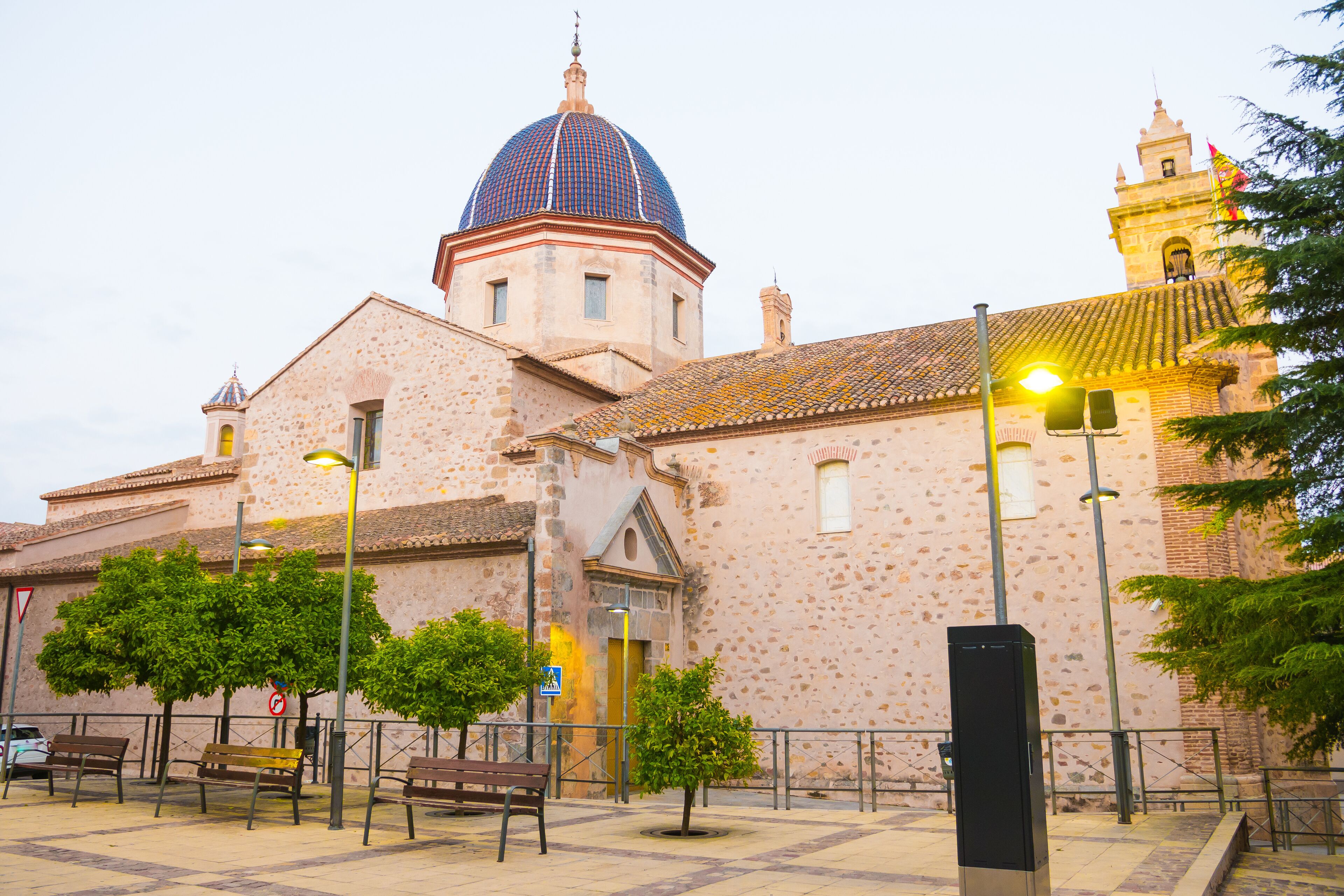 A historic building with a large dome and a bell tower.