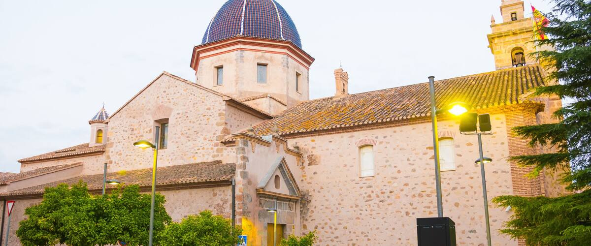 A historic building with a large dome and a bell tower.