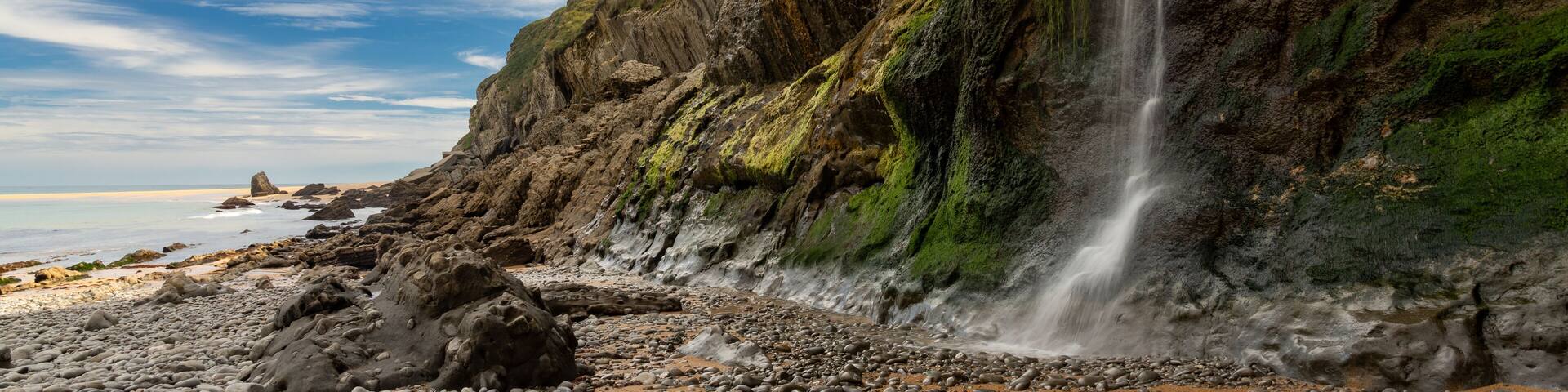 Covachos beach in the Costa Quebrada geological park in Cantabria, Spain, with the rock formations.