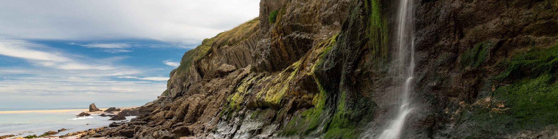 Covachos beach in the Costa Quebrada geological park in Cantabria, Spain, with the rock formations.