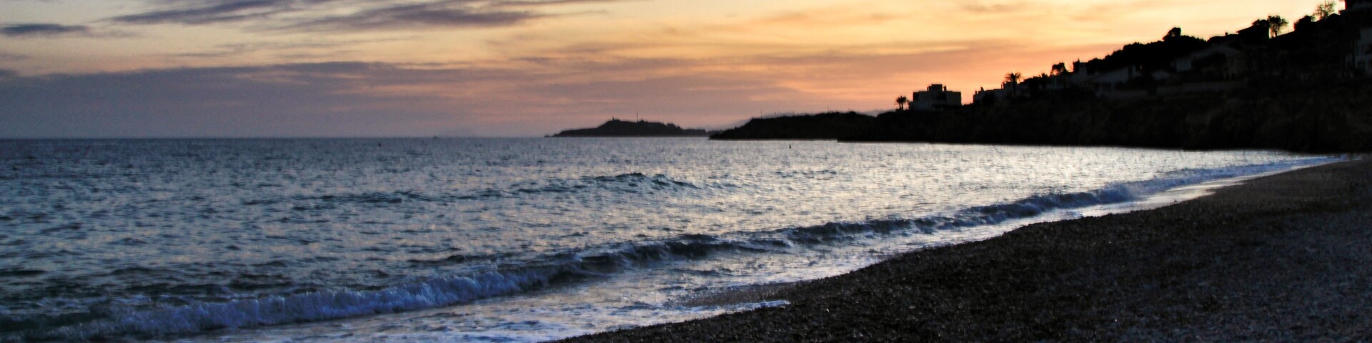 Sunset on Isla Plana beach in Cartagena, Murcia