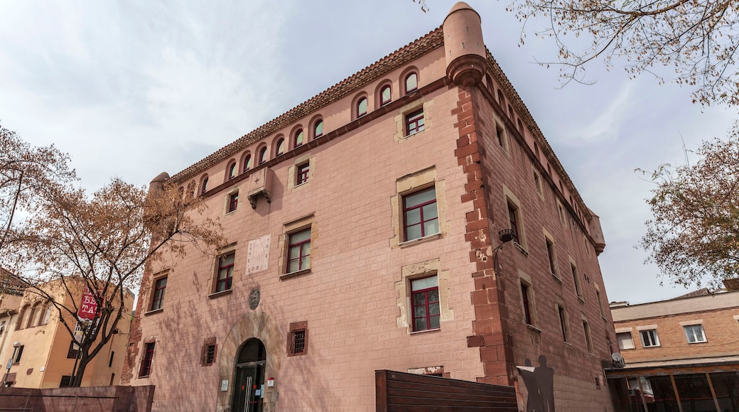 A historic building with arched windows and a brick facade.