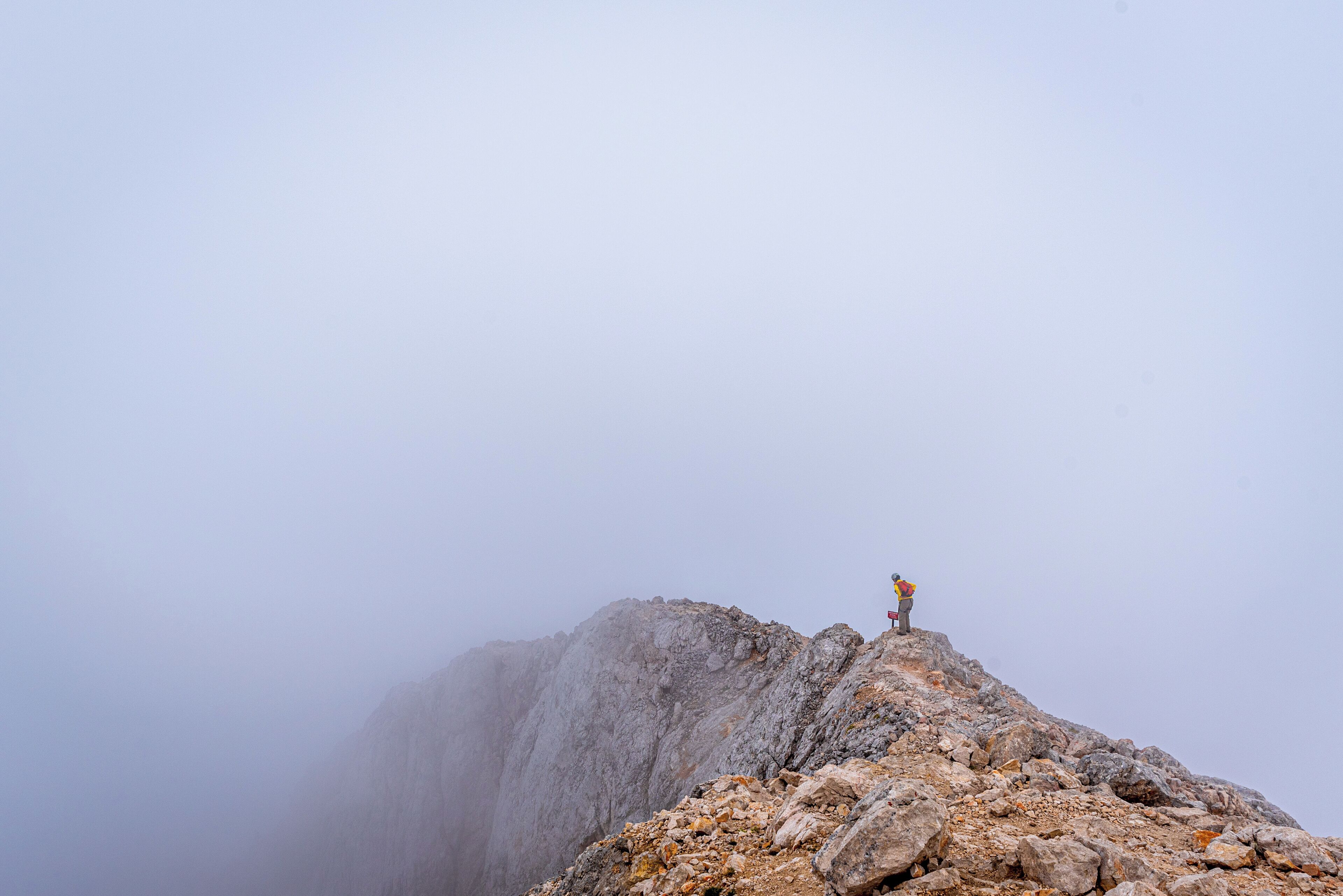 Descending from cloud covered Triglav - highest mountain in Slovenia. 

#Adventure