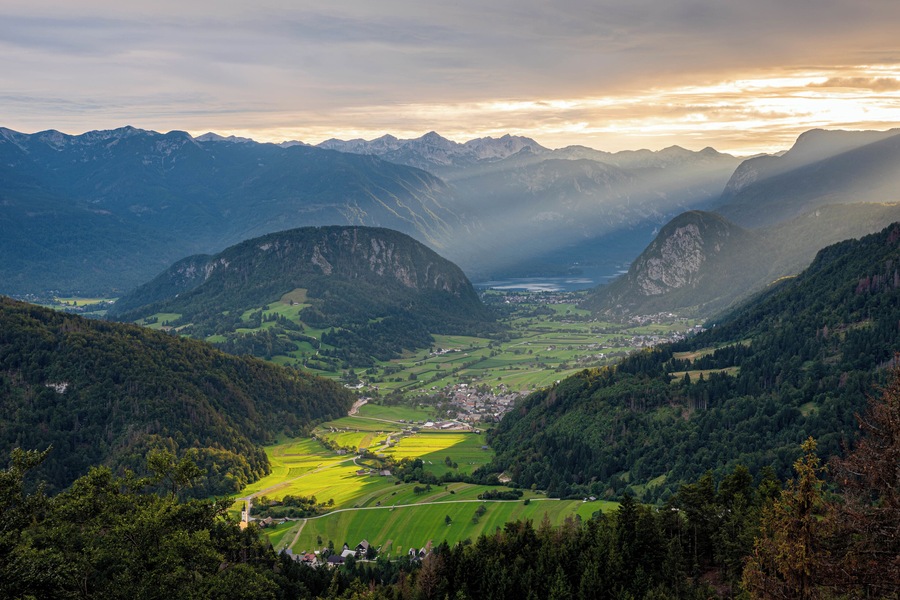 View from Vodnikov Lookout point into the Bohinj Valley. Photo was taken about 40 minutes before sunset, when the last sun rays hit the valley.
