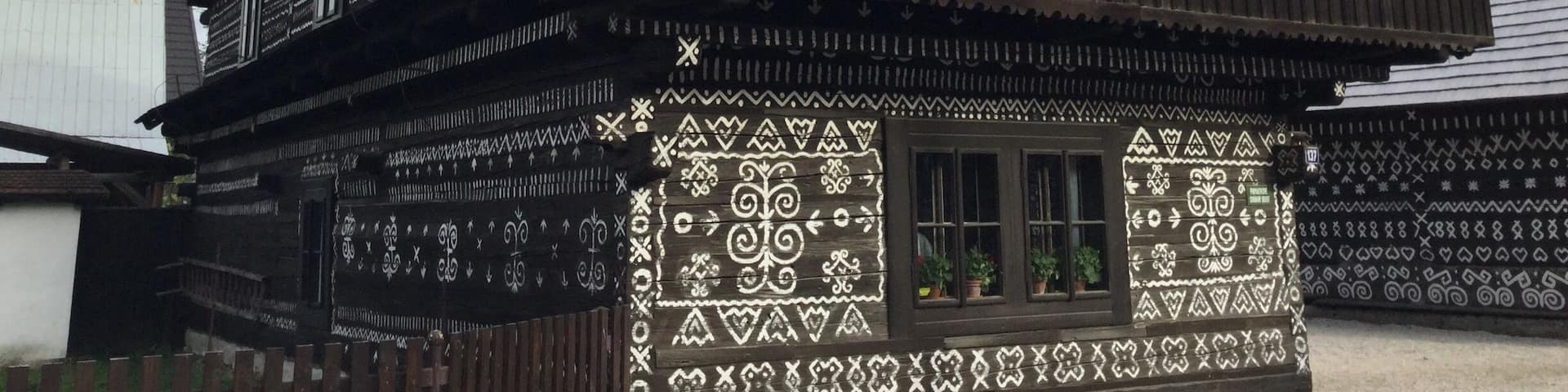 The village of Čičmany is situated in Strážovské vrchy, approximately half way between Trenčín and Žílina.
This village was famous for embroidery of traditional folk costumes, which later grew into the intricate painting of similar designs on the wooden houses. Destroyed by fire in 1921, the village was rebuilt, only to be destroyed again during WWII. Rebuilt for a second time with state aid, the village was the first in the world to be declared a ‘Reserve of Folk Architecture’.
Not the easiest place to get to. A bus from Žilina (via Rajec), or do as I did, and hike there from the village of Zliechov. The famous Cesta hrdinov SNP hiking trail passes through the village.
#architecture #hiddengem #hiking