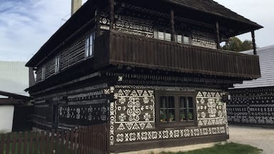 The village of Čičmany is situated in Strážovské vrchy, approximately half way between Trenčín and Žílina.
This village was famous for embroidery of traditional folk costumes, which later grew into the intricate painting of similar designs on the wooden houses. Destroyed by fire in 1921, the village was rebuilt, only to be destroyed again during WWII. Rebuilt for a second time with state aid, the village was the first in the world to be declared a ‘Reserve of Folk Architecture’.
Not the easiest place to get to. A bus from Žilina (via Rajec), or do as I did, and hike there from the village of Zliechov. The famous Cesta hrdinov SNP hiking trail passes through the village.
#architecture #hiddengem #hiking