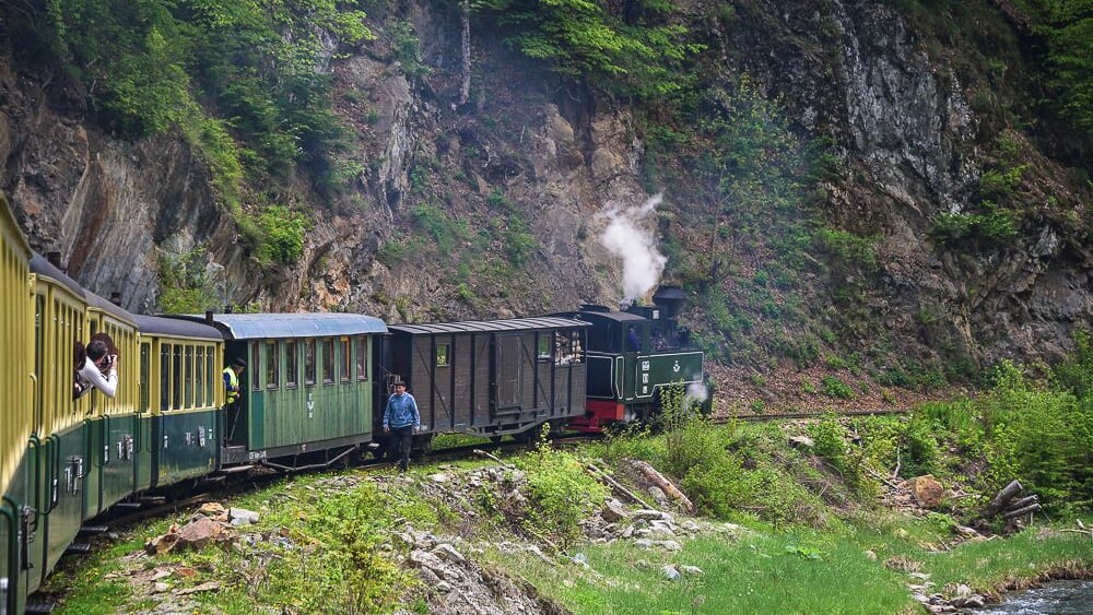 "Mocanita" is a steam engine train that takes tourists through the gorges of the Vaser River in the region of Maramures, Romania.