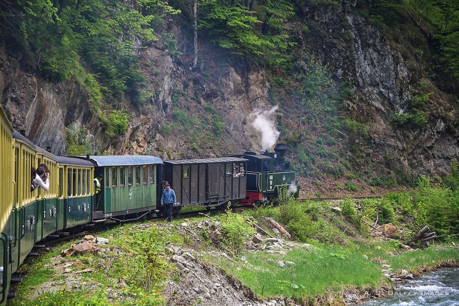 "Mocanita"  is a steam engine train that takes tourists through the gorges of the Vaser River in the region of Maramures, Romania.