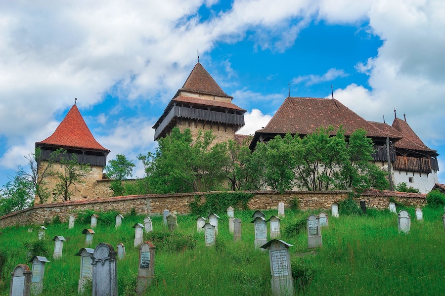 Viscri fortified church cemetery. Just around the corner past the chickens.
http://www.alwayswanderlust.com/sibiu-romania-the-heart-of-transylvania/