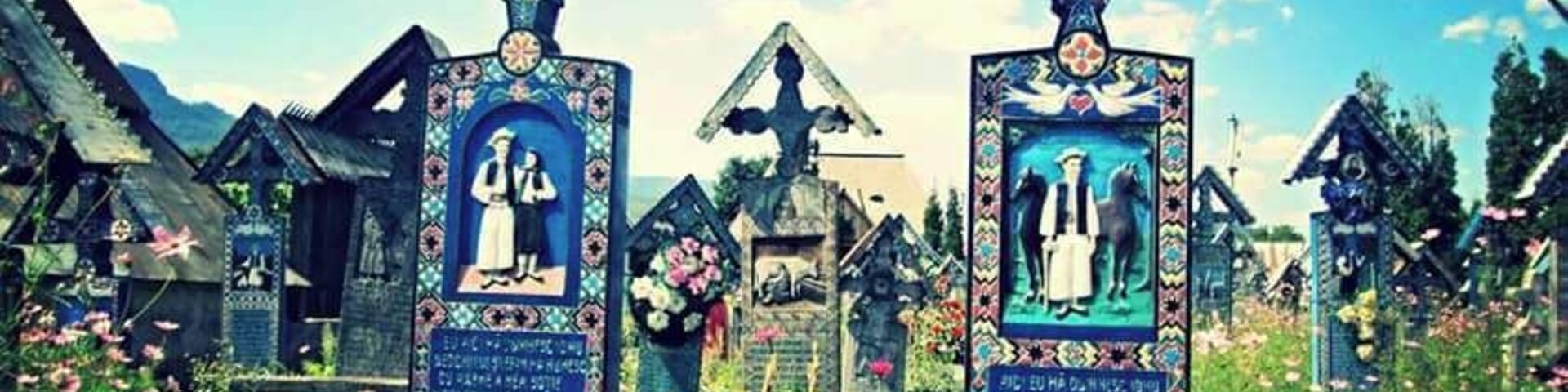 Săpânța is a commune in Maramureș County in northern Romania, 15 kilometers northwest of Sighet and just south of the Tisza River. It is composed of a single village, Săpânta.
It is known for its "Merry Cemetery"
Source:Wikipedia