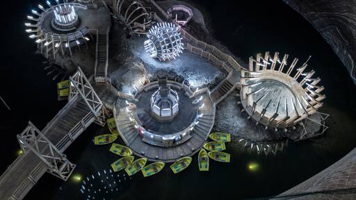 Circular buildings on lake in Salina Turda
