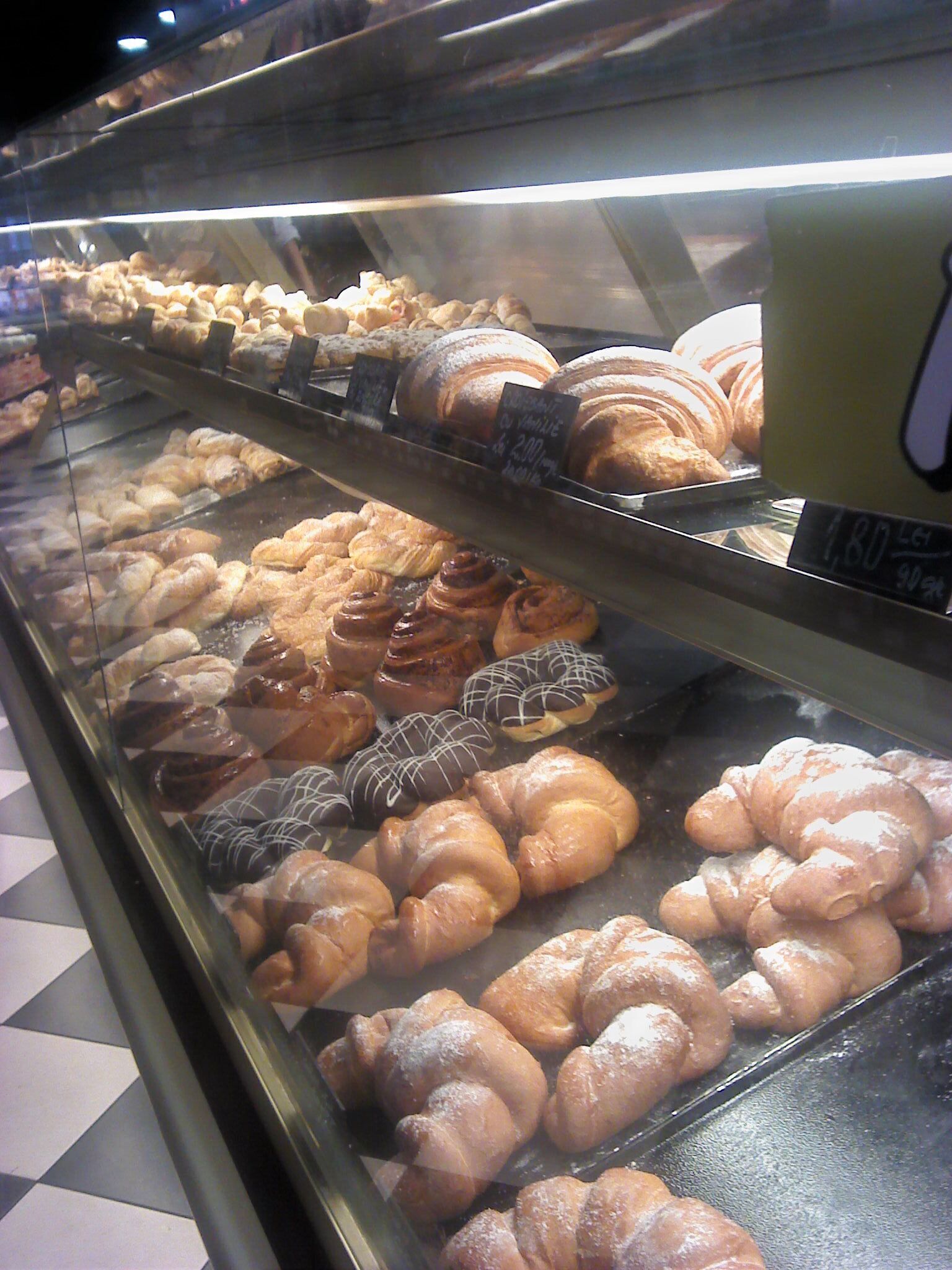 Romanian pastry at its best!
#Delicious, fresh, and inexpensive snacks. 
This surely is one of my favourite places when it comes to sweets. Do try out my all-time favourite: 'cornul-crocodil' [=the crocodile croissant].