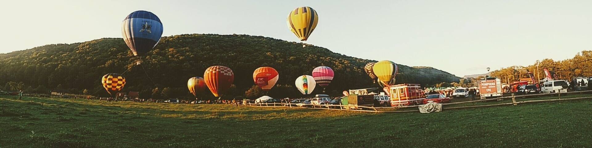 International hot air balloon #Festival. Impressive show at dusk, in a beautiful area of Romania.
#colorful