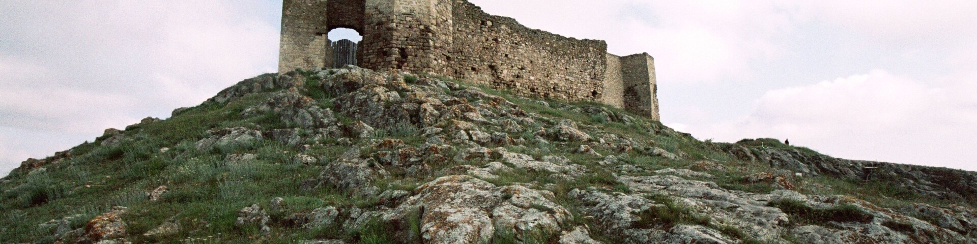 The fortress, located 2 km far from Enisala locality, on a calcareous hill which rises above Razim and Babadag lakes area, was built in the second half of the 14th century, for military purpose, probably by the Genoese merchants,#Adventure
