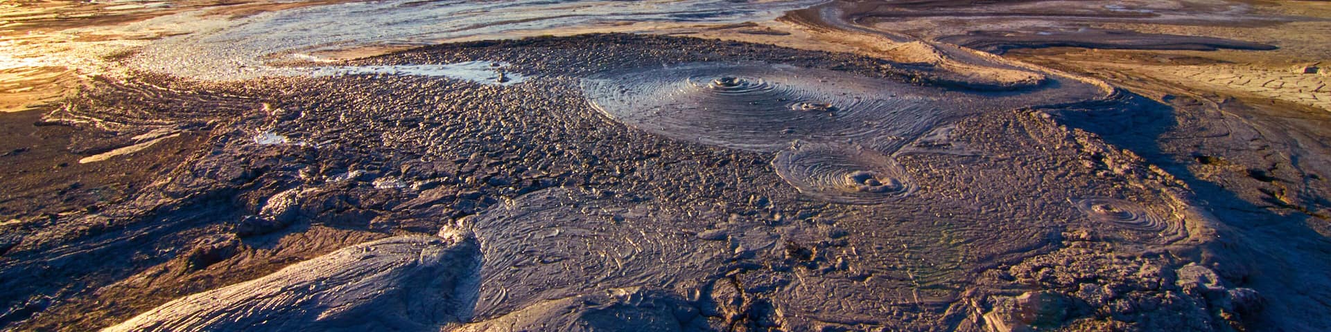 Sunrise in the Muddy Volcanoes National Reservation in Romania,Berca,Buzau,Vulcanii Noroiosi. Muddy Volcanoes landscape.