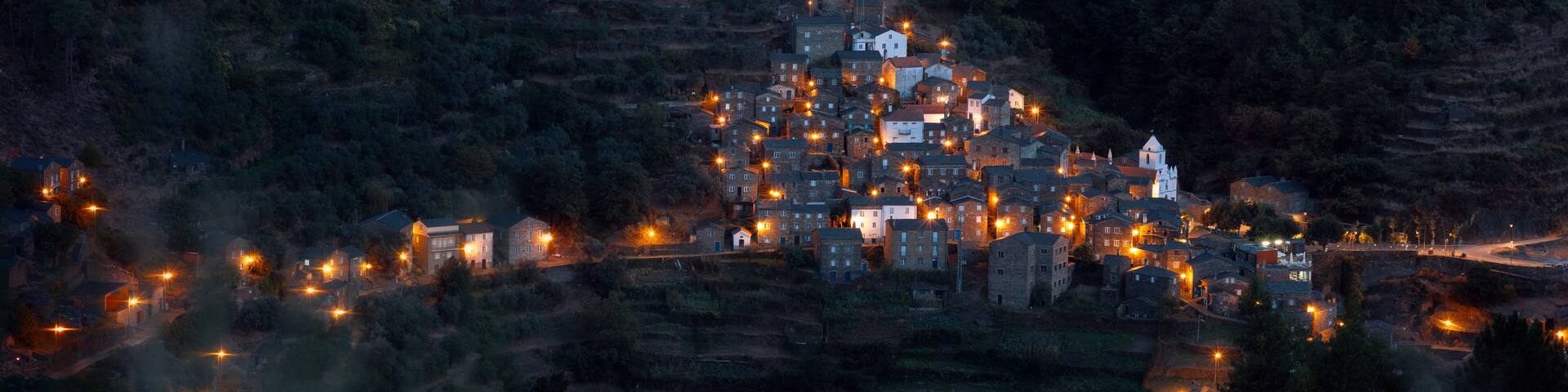 night view of the lights of small city in the mountains