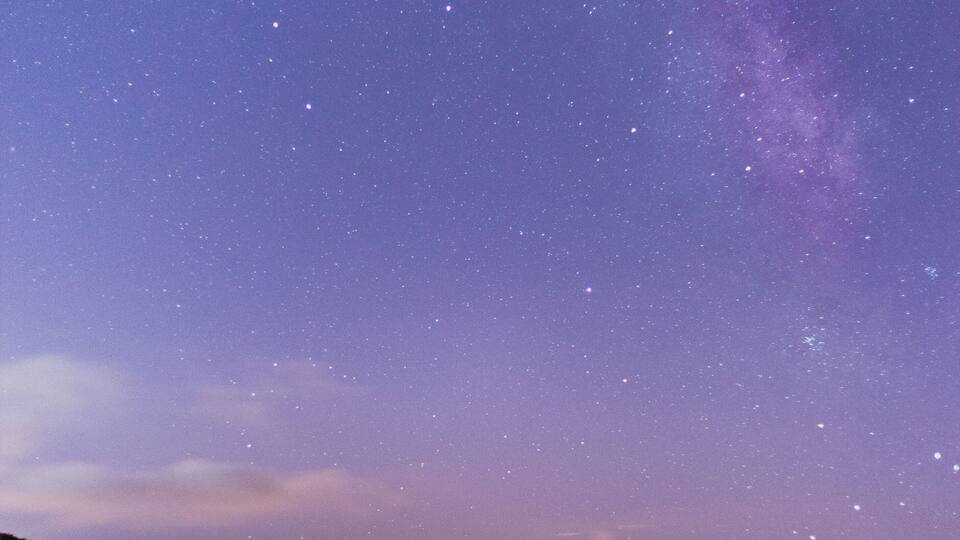This is one of the beaches from this area with less light pollution, so during summer time it's one of the best places to shoot the milkyway (the orange light in the clouds is the light from the next city.
Careful because the beach at night it's pitch black, so careful with the waves