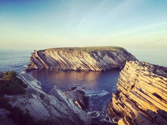 Baleal is a small island located 3 kilometres north of Peniche, in the western region of Portugal, separated from the mainland by a tombolo. At the extremity of the island one can find the inaccessible ilhota das Pombas and the ilhéu de Fora. Baleal has a past related to whaling.