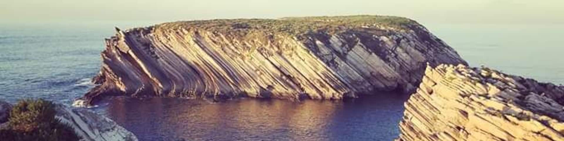 Baleal is a small island located 3 kilometres north of Peniche, in the western region of Portugal, separated from the mainland by a tombolo. At the extremity of the island one can find the inaccessible ilhota das Pombas and the ilhéu de Fora. Baleal has a past related to whaling.