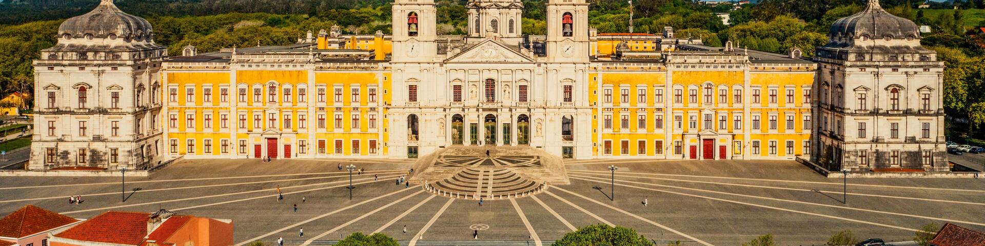 Aerial view of the Palace of Mafra. Unesco world heritage in Portugal. Aerial top view of the Royal Convent and Palace of Mafra, baroque and neoclassical palace. Drone view of a historic castle.